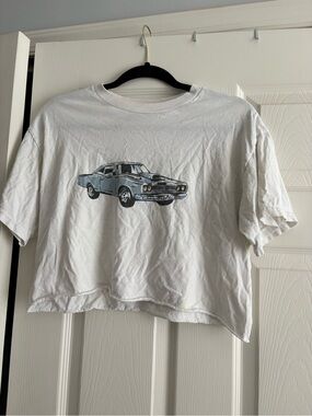 Brandy Melville White Cropped Tee with Light Blue Car Graphic